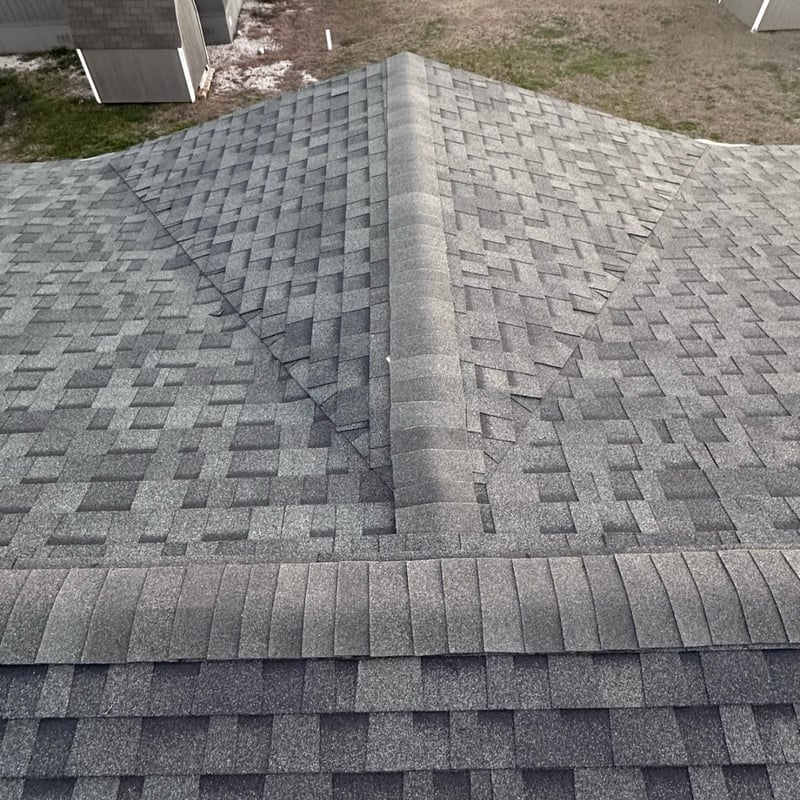 After photo of a Houston, TX home with a brand-new architectural asphalt shingle roof installed by Tex Mex Roofing.