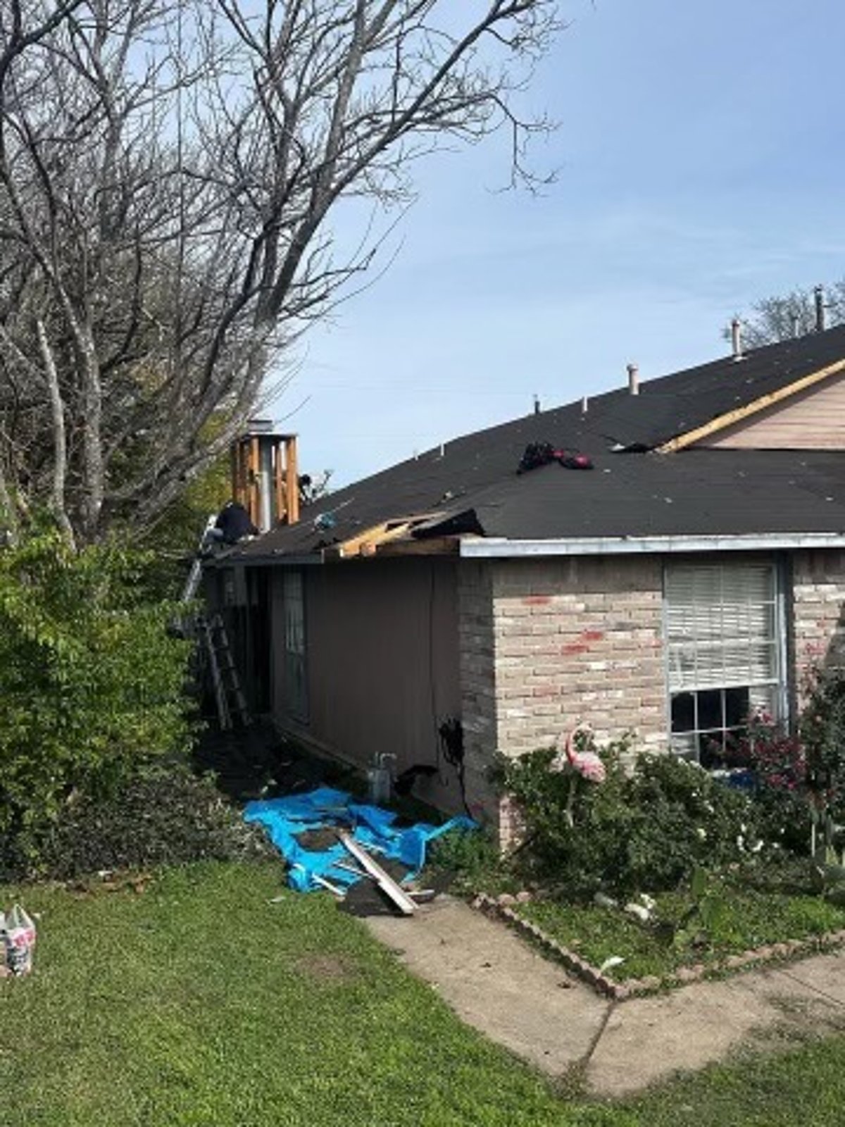 Pflugerville TX residential roof replacement with chimney upgrade