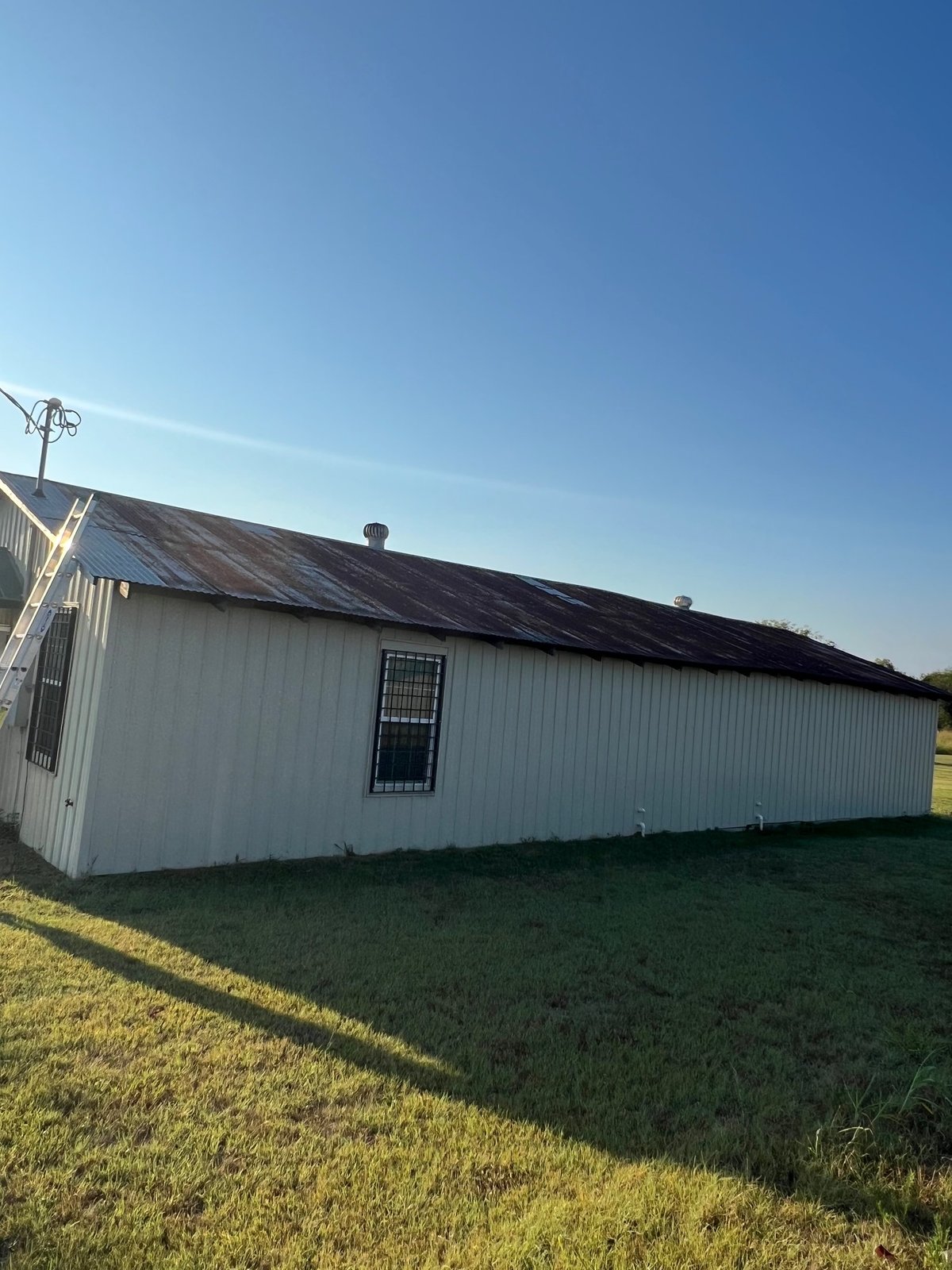 Temple TX residential R-Panel metal roof in Cocoa Brown — close view